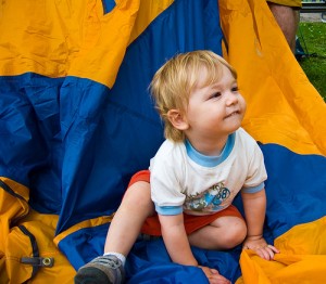 Make sure your kid is a happy camper! Photo by Jason Pratt